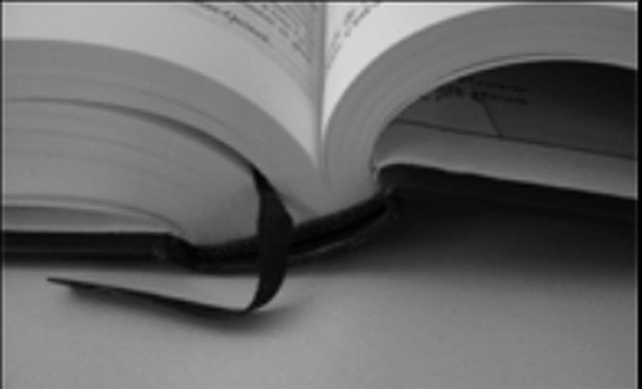 Livro aberto representando encadernação